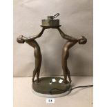 AN ART DECO-STYLED BRASS FIGURAL TABLE LAMP ON A MARBLE BASE