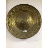18TH/19TH CENTURY CONTINENTAL EMBOSSED BRASS CIRCULAR CHARGER, 40CM