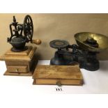 A VINTAGE CAST IRON COFFEE GRINDER ON A WOODEN BASE, TOGETHER WITH TWO SETS OF SCALES WITH WEIGHTS