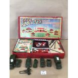 A VINTAGE BOXED BAYKO BUILDING SET WITH EIGHT DINKY DIE CAST MILITARY VEHICLES