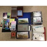 A LARGE COLLECTION OF UK AND JERSEY FIRST DAY COVERS ALBUMS