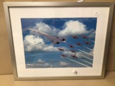 A CONCORDE FLYING WITH RED ARROWS WITH TWO SIGNATURES ONE BY THE CHIEF CONCORDE PILOT, FRAMED AND