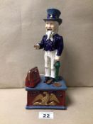 A CAST-IRON ‘UNCLE SAM’ MECHANICAL MONEY BOX 29CM IN HEIGHT