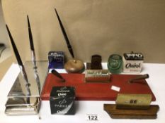 A MIXED COLLECTION OF PEN DESK STANDS, PENS, INK, AND MORE.