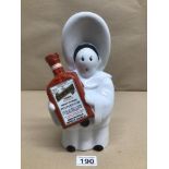 A LIMITED-EDITION COINTREAU EMPTY DECANTER LIMOGES PORCELAIN FIGURE AFTER ORIGINAL CREATED BY JEAN