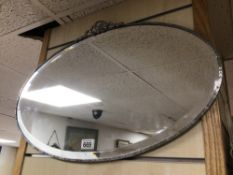 1960'S OVAL SHAPED BEVELLED MIRROR, 70 X 44CM