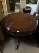 LARGE MAHOGANY ROUND REPRODUCTION DRUM TABLE WITH FOUR DRAWERS ON PEDESTAL BASE AND BRASS CLAW