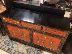 CHINESE BLACK LACQUER CHINOISERIE CABINET WITH THREE DRAWERS DECORATED WITH FIGURES AND PAINTED
