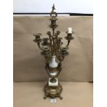 A GILT BRASS AND MARBLE SIX BRANCH CANDELABRA, STAMPED BREVETTATO (N7087-B77) TO BASE, 69CM