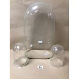 THREE GLASS DOMES LARGEST BEING 43CM