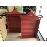 A PAIR OF JAPANESE INFLUENCED RED WOOD AND BAMBOO DISPLAY UNITS WITH FOUR GLASS SHELVES AND