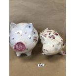 TWO PORCELAIN PIGGY BANKS, ONE A/F AND ONE WITH STOPPER BOTH WITH FLORAL DETAILING, LARGEST BEING