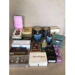 A COLLECTION OF LADIES PERFUME AND GENT’S COLOGNE BOTTLES, MOST OF WHICH ARE BOXED AND SOME WITH