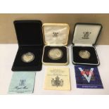 THREE SILVER PROOF ROYAL MINT COINS, 1980 QUEEN MOTHER £5 CROWN, 2005 60TH ANNIVERSARY OF WWII £2