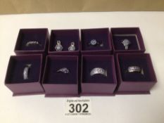 SEVEN 925/WHITE METAL RINGS WITH A 925 PAIR OF EARRINGS
