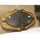 A 1960'S/70'S RETRO DECORATIVE WALL MIRROR, 37CM X 60CM