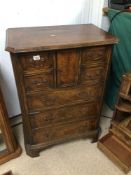 A VINTAGE WALNUT TALLBOY