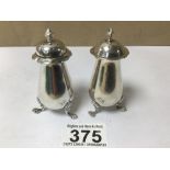 PAIR OF EDWARDIAN HALLMARKED SILVER PEPPERS ON PAD FEET, 8CM S. BLANKENSEE, AND SONS OF