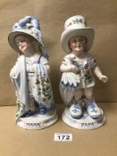 PAIR OF CONTINENTAL ‘MAMA’ AND ‘PAPA’ PORCELAIN FIGURINES, LARGEST BEING 27CM IN HEIGHT
