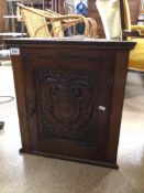 SMALL OAK CUPBOARD WITH CARVED DOOR