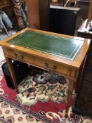 A REPRODUCTION TWO DRAWER HALL TABLE WITH GREEN LEATHER