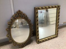 TWO VINTAGE GILT FRAMED WALL MIRRORS ONE ROCOCO STYLED OVAL-SHAPED AND THE OTHER RECTANGULAR,