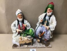 PAIR OF PAPIER-MÂCHÉ FIGURES OF MIDDLE EASTERN MEN ONE BEING A SCHOLAR AND THE OTHER IS SMOKING A