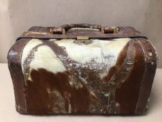 AN ARIES MADRIO HIDE/LEATHER CASE