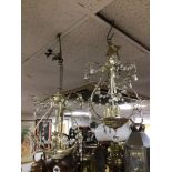 PAIR OF GLASS AND BRASS CHANDELIERS