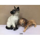 TWO BESWICK PORCELAIN FIGURINES OF A SIAMESE CAT AND LION, THE LARGEST BEING 24CM IN HEIGHT