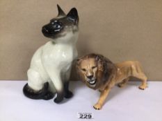 TWO BESWICK PORCELAIN FIGURINES OF A SIAMESE CAT AND LION, THE LARGEST BEING 24CM IN HEIGHT