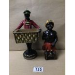 TWO VINTAGE BLACKAMOOR FIGURINES, ONE BEING OF A BOY CARRYING/HOLDING A WICKER BASKET