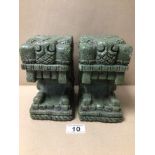 A PAIR OF COLOMBIAN STYLED STONE BOOKENDS