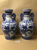 A PAIR OF QING DYNASTY BLUE AND WHITE CHINESE BALUSTER SHAPED VASES WITH SIX CHARACTER SEAL MARKS TO