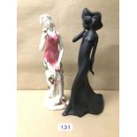 TWO LARGE FIGURINES ONE BEING OLD TUPTON WARE OF A FLORAL LADY. THE OTHER IS A BLACK BASALT, ROYAL