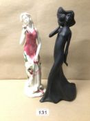 TWO LARGE FIGURINES ONE BEING OLD TUPTON WARE OF A FLORAL LADY. THE OTHER IS A BLACK BASALT, ROYAL