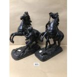 A PAIR OF VICTORIAN PAINTED SPELTER MARLEY HORSE GROUPS, 33CM (LEG A/F)