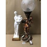 A LARGE HALF-NUDE FEMALE FIGURINE WITH A LARGE BRONZED FIGURAL TABLE LAMP A/F, LARGEST BEING 58CM IN