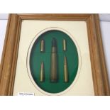 FRAMED AND GLAZED INERT 45 MAG AND OTHER BULLETS
