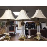 A PAIR OF BRASS AND GLASS COLUMN LAMPS, 56CM