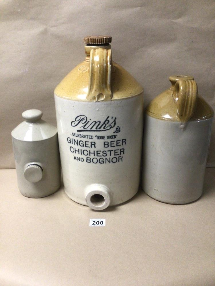 THREE STONEWARE/EARTHENWARE FLAGONS, ONE LABELLED ‘PINK’S GINGER BEER CHICHESTER AND BOGNOR’,