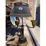 AN EARLY BLACK AND GOLD TOLEWARE METAL PIANO LAMP