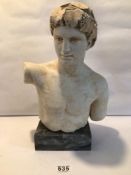 A CERAMIC SCULPTURE OF A ROMAN BUST ON MARBLE BASE, 38CM