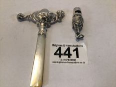 925 SILVER BABIES RATTLE WITH MOTHER OF PEARL HANDLE AND A 925 SILVER WHISTLE WITH A DOG'S HEAD