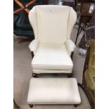 VINTAGE WINGBACK ARMCHAIR WITH STOOL IN NEUTRAL COLOUR