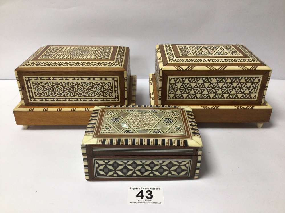 TWO VINTAGE CIGARETTE BOXES ONE BEING MUSICAL ALONG WITH ONE OTHER INLAY BOX