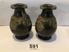 TWO SMALL BRONZE VASES DECORATED WITH SWAGS AND TAILS, 12CM