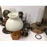 A QUANTITY OF VINTAGE OIL LAMPS INCLUDES A COPPER P. J BRYANT OF BRISTOL