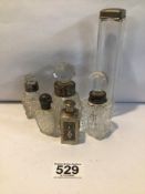 FIVE SILVER TOP BOTTLES WITH A WHITE METAL PERFUME BOTTLE