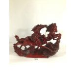 A RED RESIN STATUE OF HORSES, 40CM